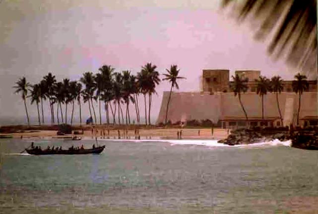 Canoe approaching Elmina Castle, 2001